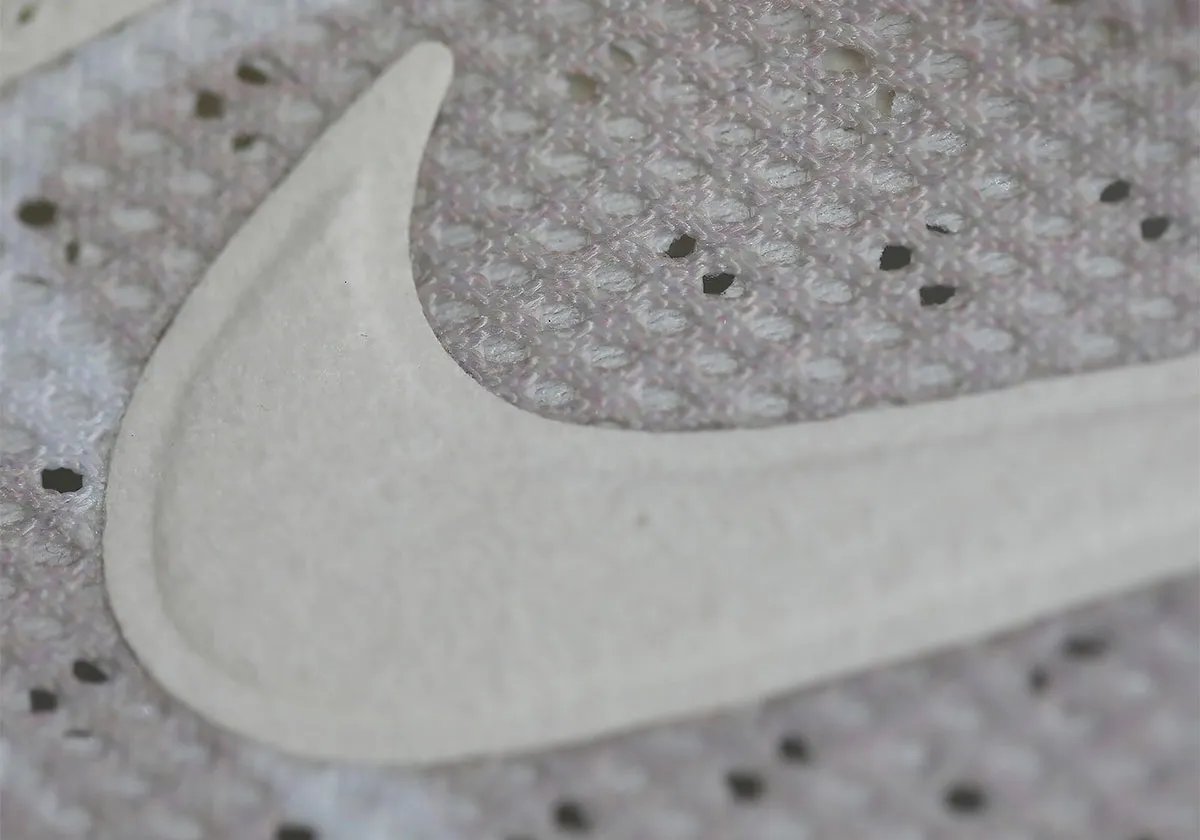 Nike Zoom Streak 3 in Cream II/Sail colorway, showing the flush upper construction and neutral palette of the 2009 performance runner returning as a lifestyle model - detail view 5