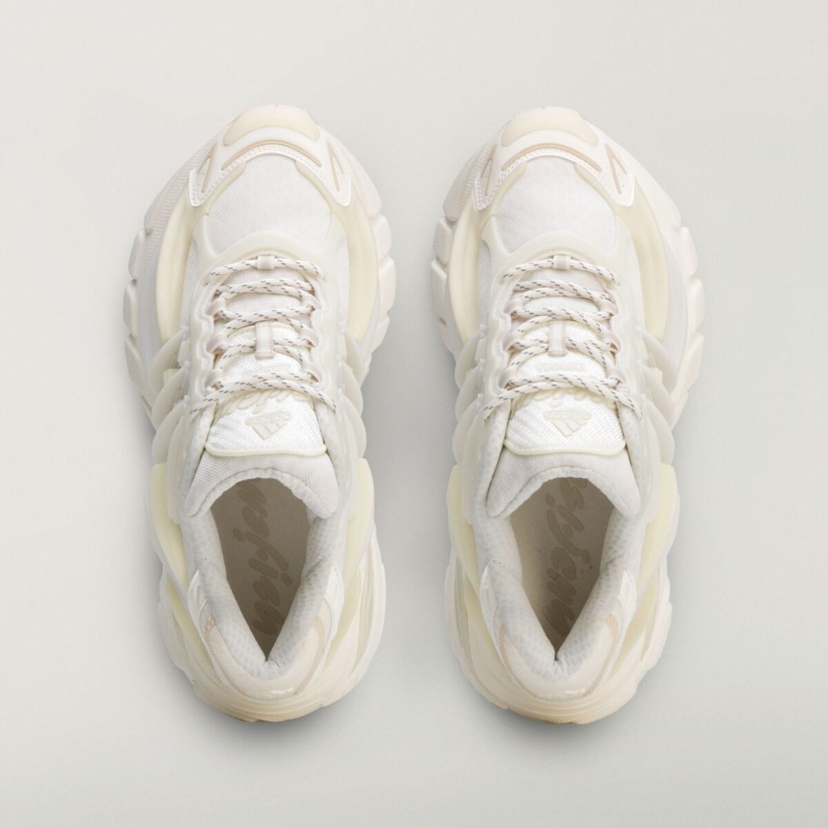 Pharrell Williams x adidas Adistar Jellyfish in Core White, Off White, and Clear Brown colorway shown from multiple angles - detail view 5