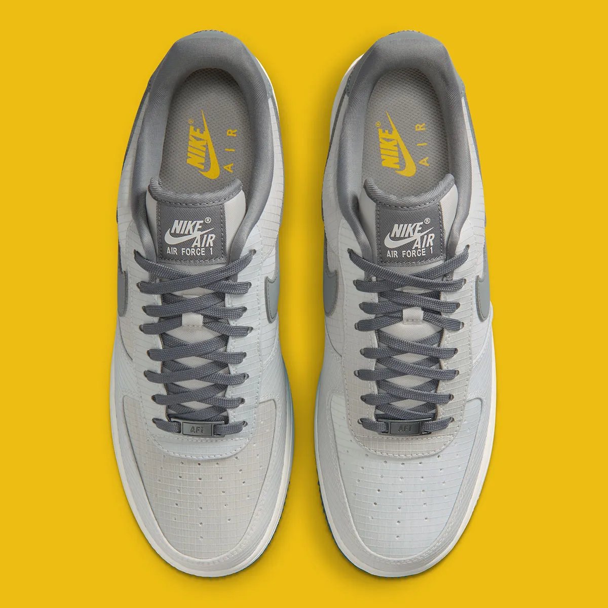 Nike Air Force 1 featuring Vibram outsole technology in neutral colorway, detail shot showing grip-focused rubber sole pattern - detail view 3