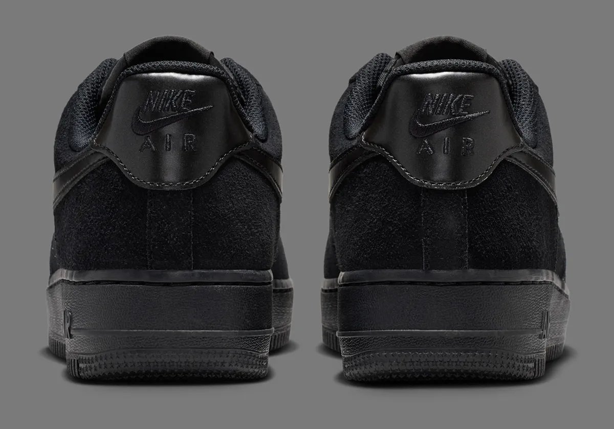 Nike Air Force 1 Low in premium suede with metallic branding details on Swoosh and heel - detail view 4