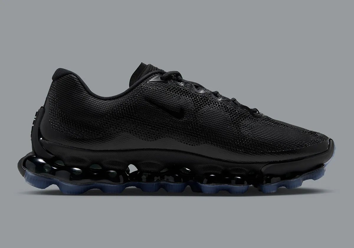 Nike Air Liquid Max in Black/Clear colorway, featuring translucent blue midsole - detail view 2