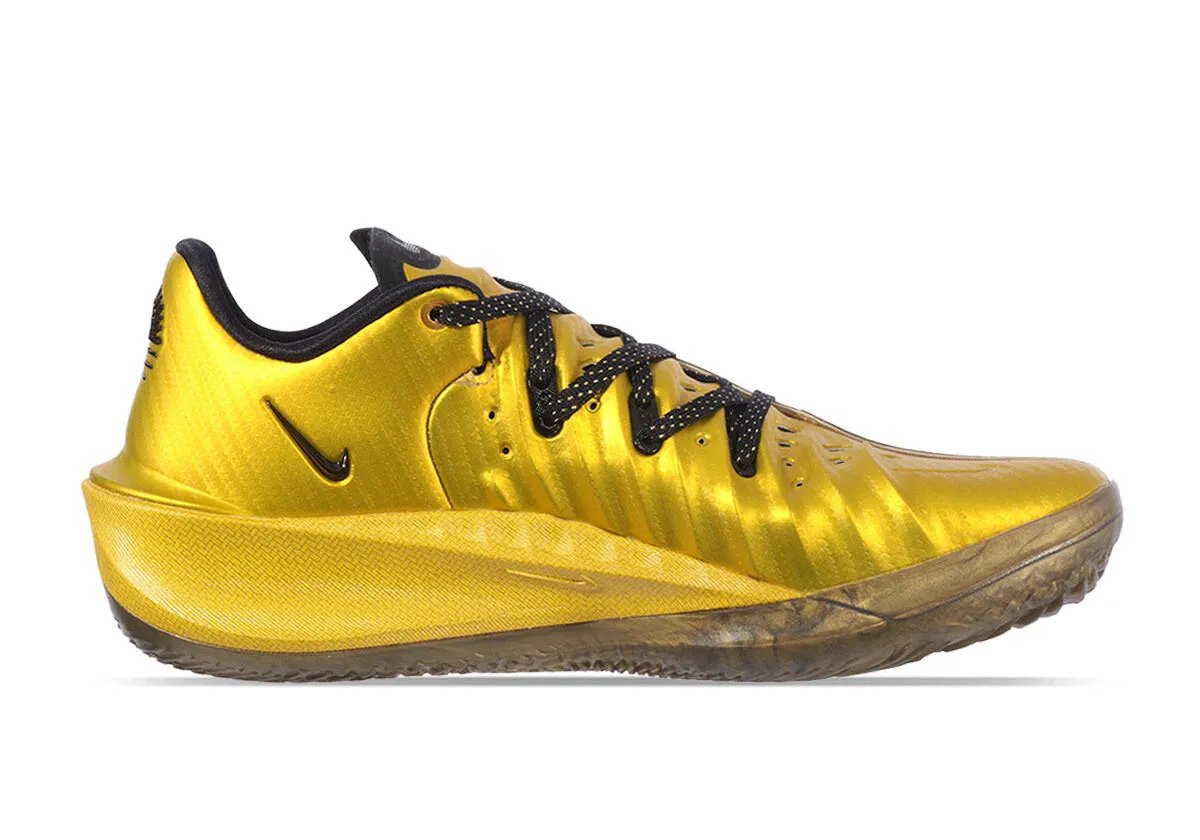 Nike GT Cut 4 in Jordan Poole's gold colorway with black trim and bronze translucent outsole - detail view 1