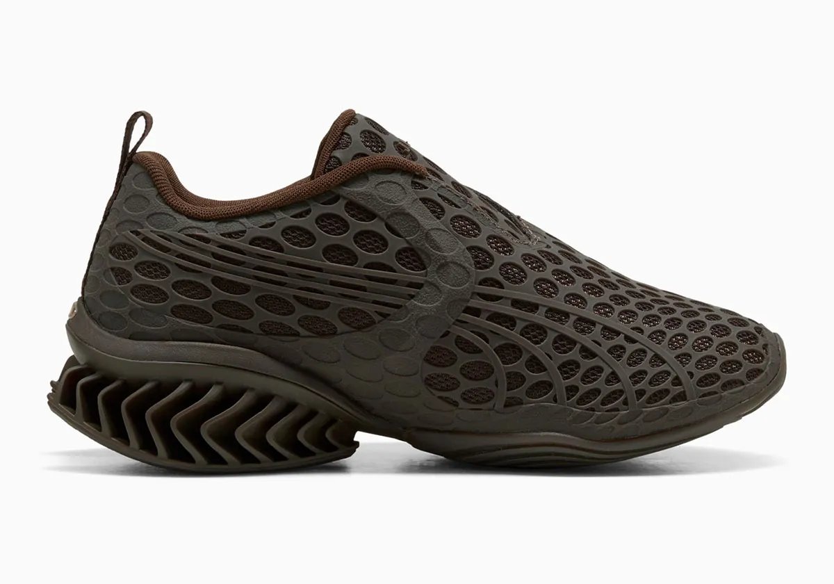 PUMA x _J.L-A.L_ Cell GEO-1 with geometric pocked cutouts across upper, lateral cage, and tongue in rich brown colorway - detail view 2