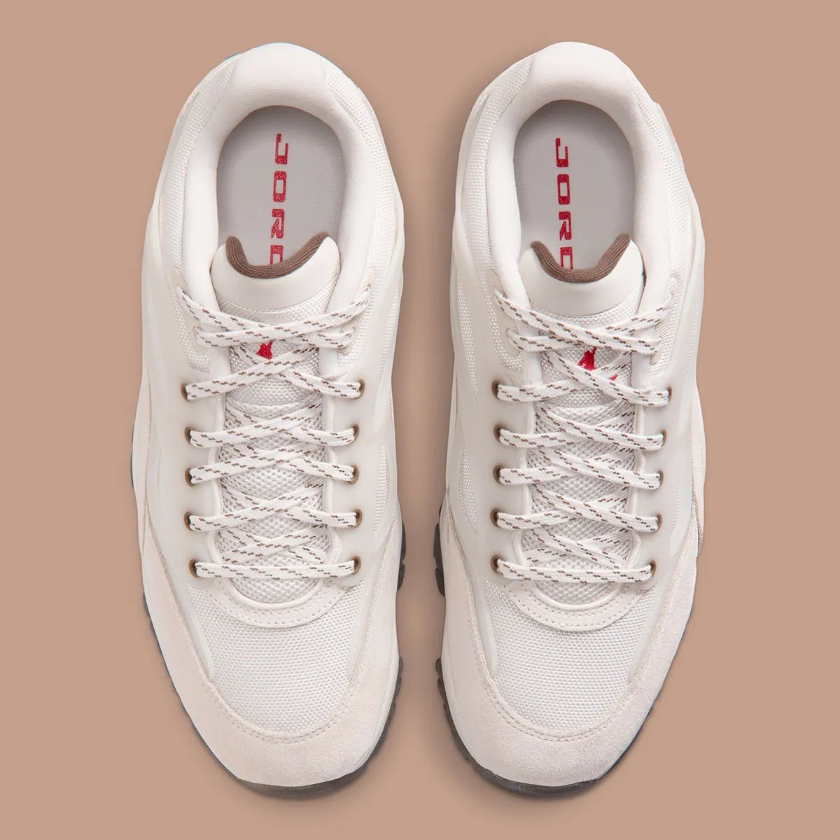 Jordan Dimension 95 Phantom showing perforated TPU cage, suede toe cap, and Red Swan outsole detailing - detail view 4