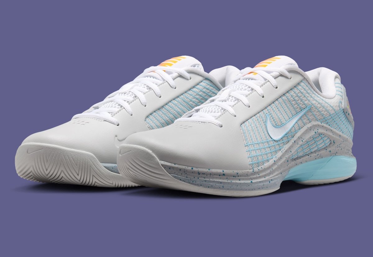Nike Zoom Vapor 12 Hypersmash in Photon Dust, Wolf Grey, Sky Blue and White, featuring Back to the Future 'Mag' theme with illuminated heel graphics and orange-to-yellow gradient tongue logo - detail view 3