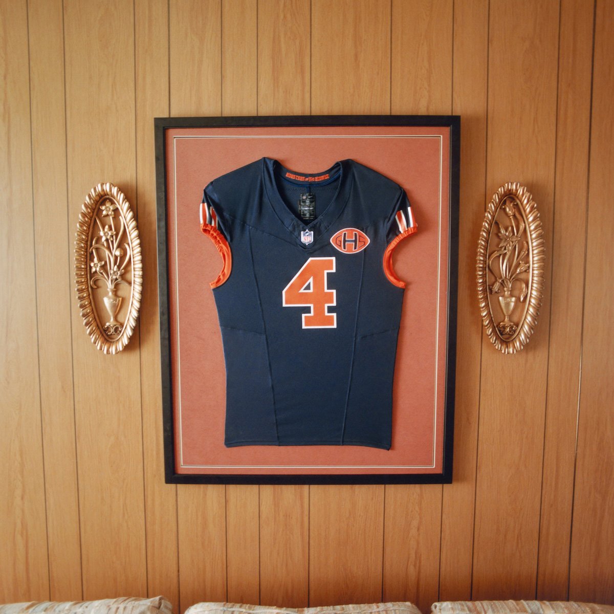 Nike NFL Rivalries 2026 alternate uniforms for eight NFC North and AFC South teams displayed on field - detail view 2
