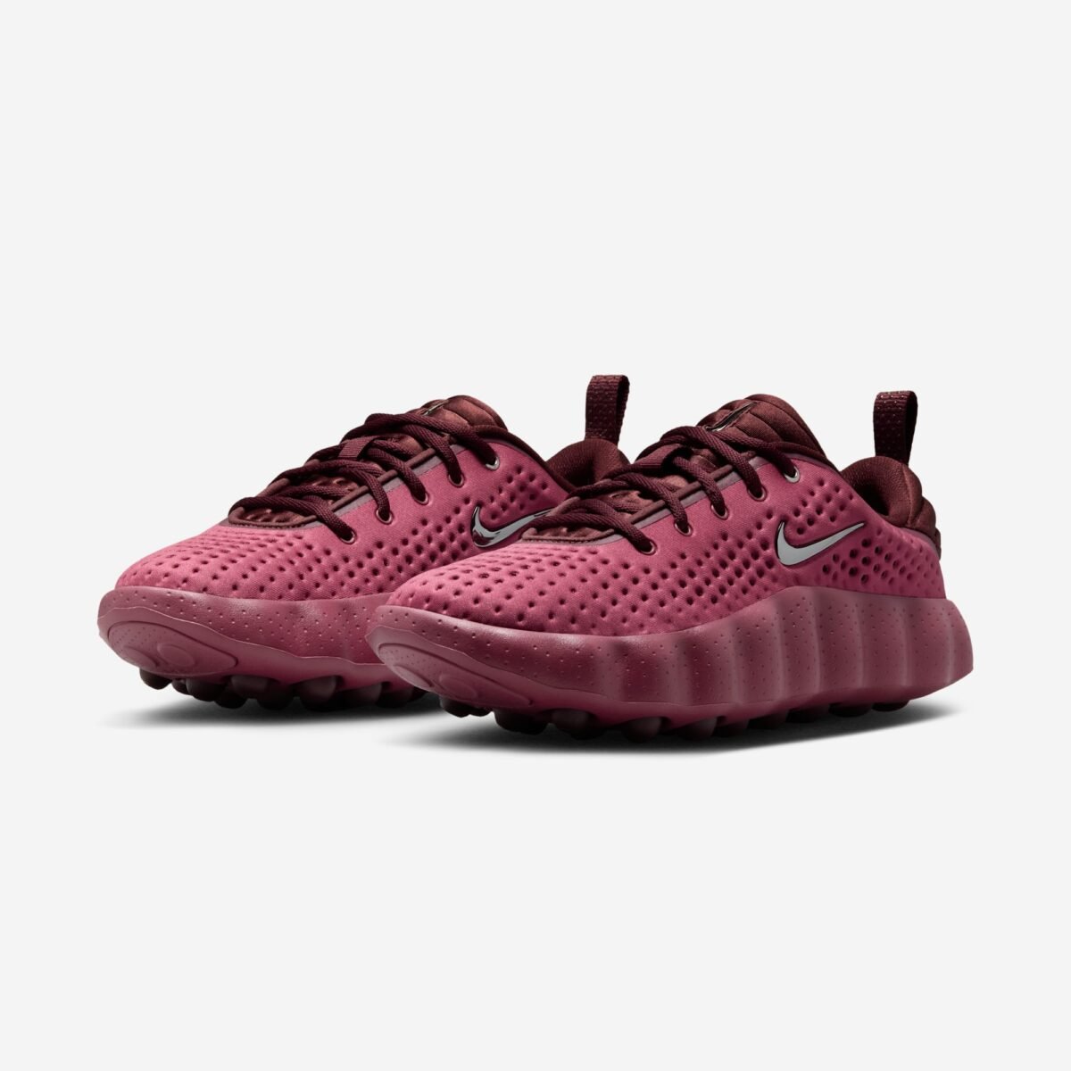 Nike Mind 002 WMNS Pink Smoke colorway featuring pink, mystic dates, and metallic silver accents - detail view 1
