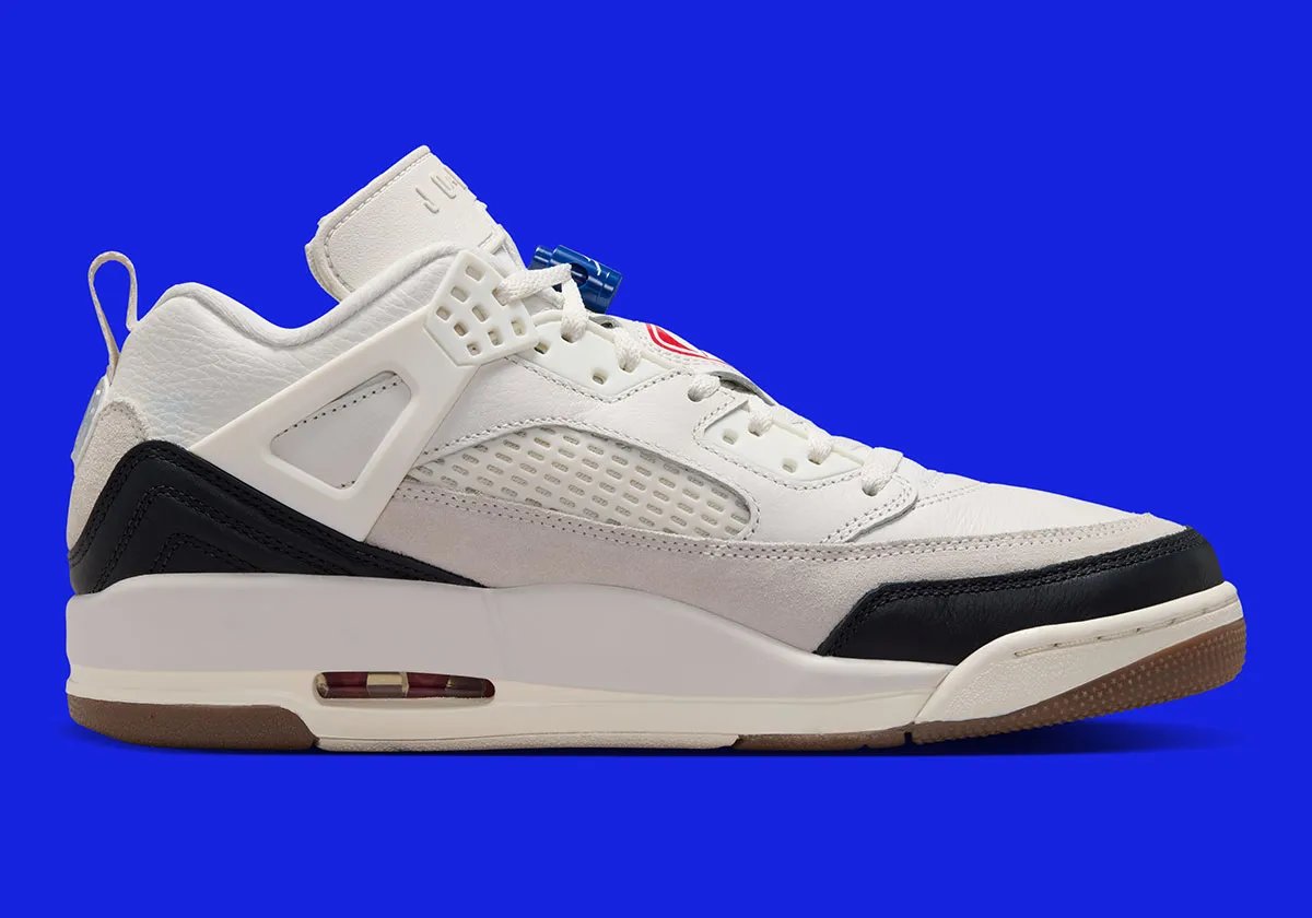 Jordan Spiz'ike Low FC in University Red and Sail with Nike Football logo on tongue and gum brown outsole - detail view 3