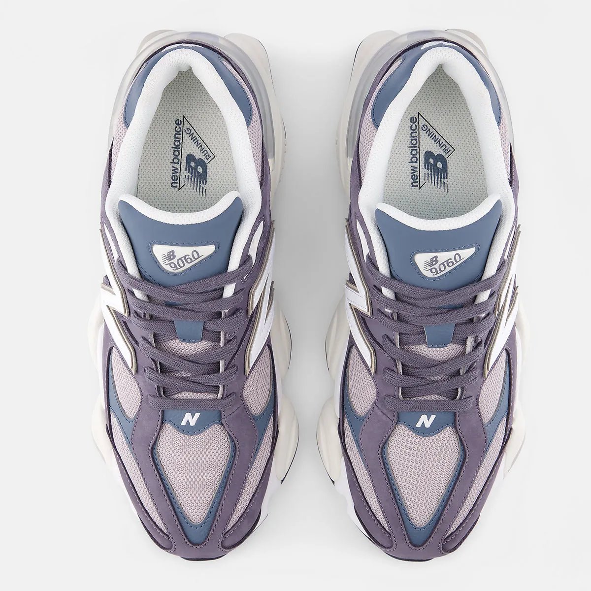 New Balance 9060 Neptune Grey featuring purple-tinted leather upper with Shadow Blue accents and violet mesh base - detail view 3