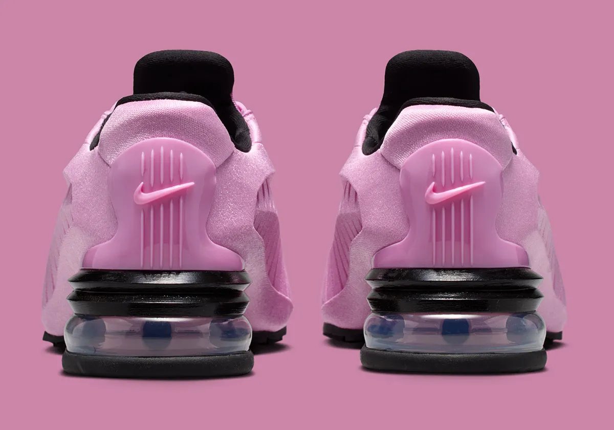 Nike Air Max Dolce Light Magenta colorway featuring gridded tongue cage, notched side panels, and translucent Air bubble sole - detail view 4