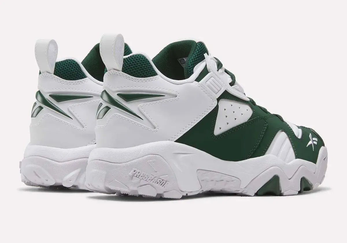 Reebok Brutus Lo in pine green and white Philadelphia Eagles colorway, showing side profile and detail of toe cap and tongue - detail view 1