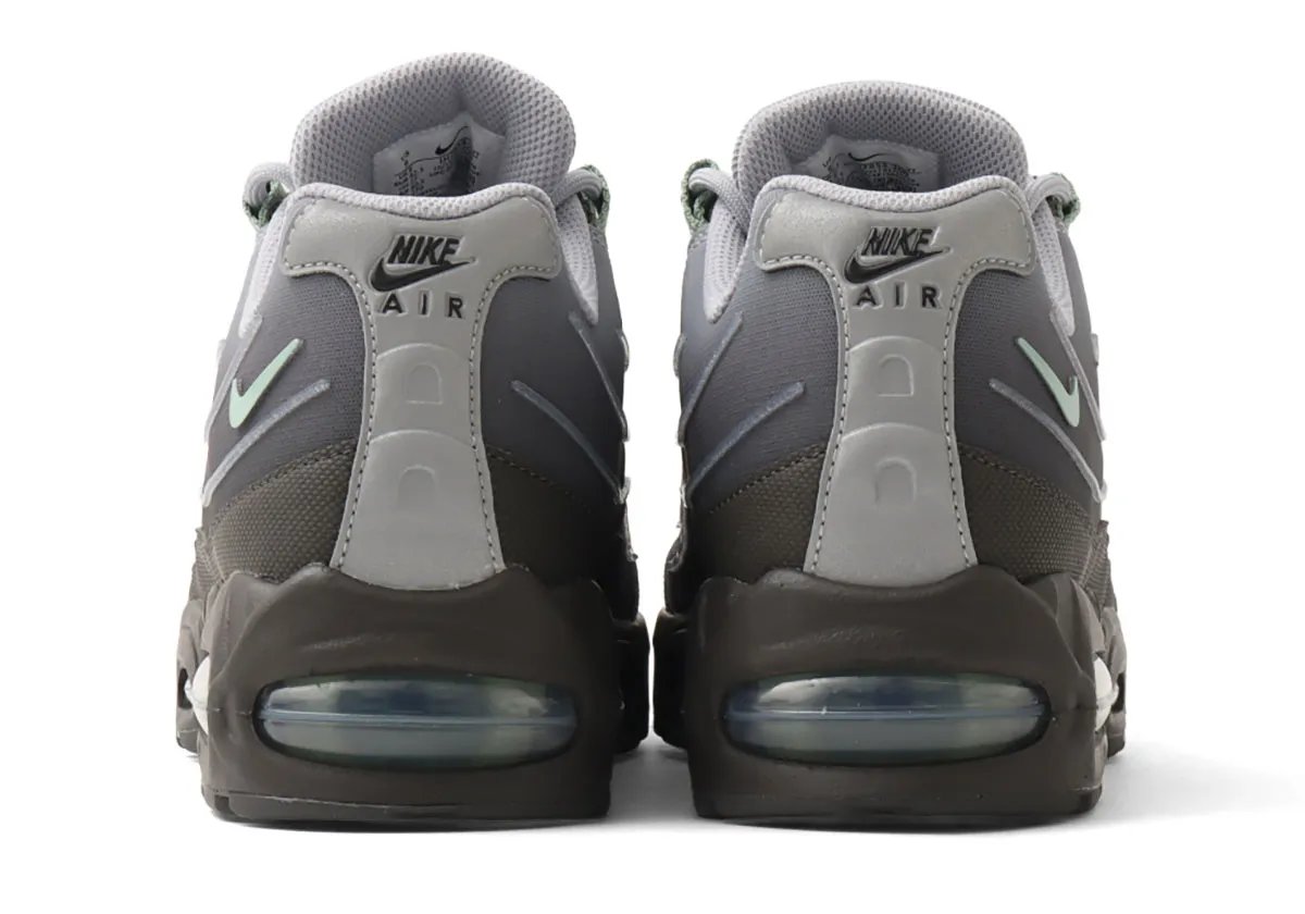 Nike Air Max 95 Tech in Steam colorway featuring translucent synthetic panels and light green accents on the Swoosh and Air units - detail view 1