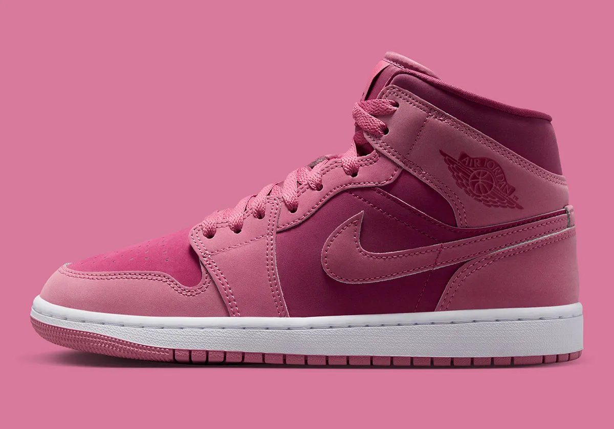 Air Jordan 1 Mid in Desert Berry and Sweet Beet colorway, showing mauve pink overlays and burgundy accents on the toe box and collar - detail view 1