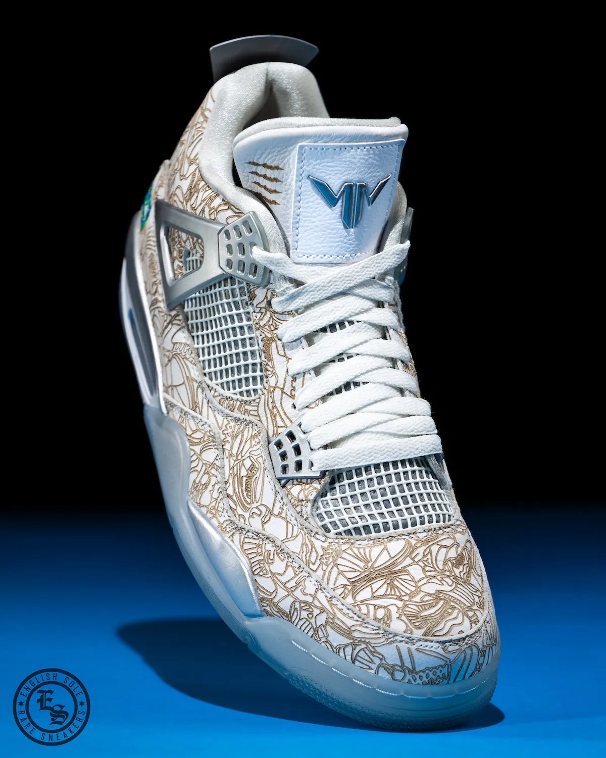Maya Moore's custom Air Jordan 4 "Laser" PE in white leather with laser engraving and Minnesota Lynx team color accents - detail view 4
