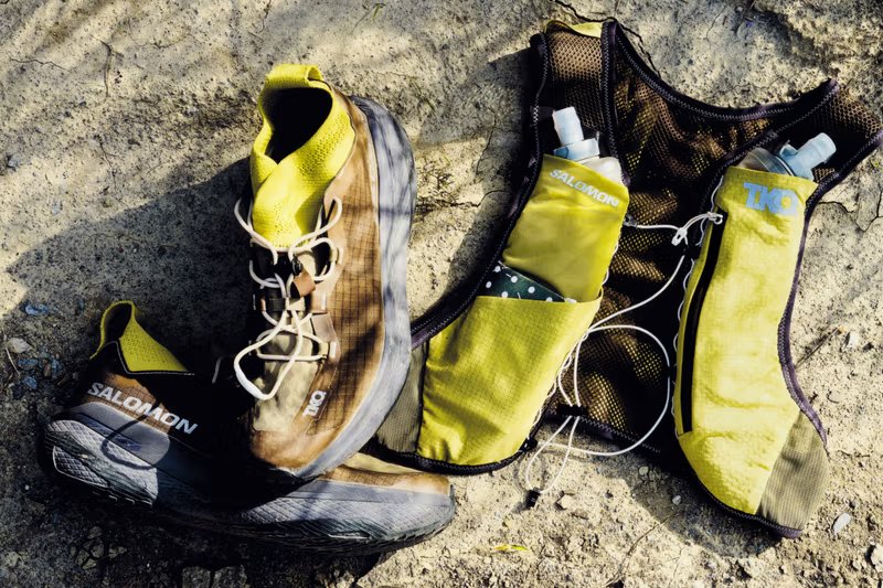Salomon x Pas Normal Studios GRVL Concept hybrid training shoe with PEBA supercritical foam midsole and carbon blade construction, displayed with RACE SKIN 2 running vest from the T.K.O. SS26 collection - detail view 4
