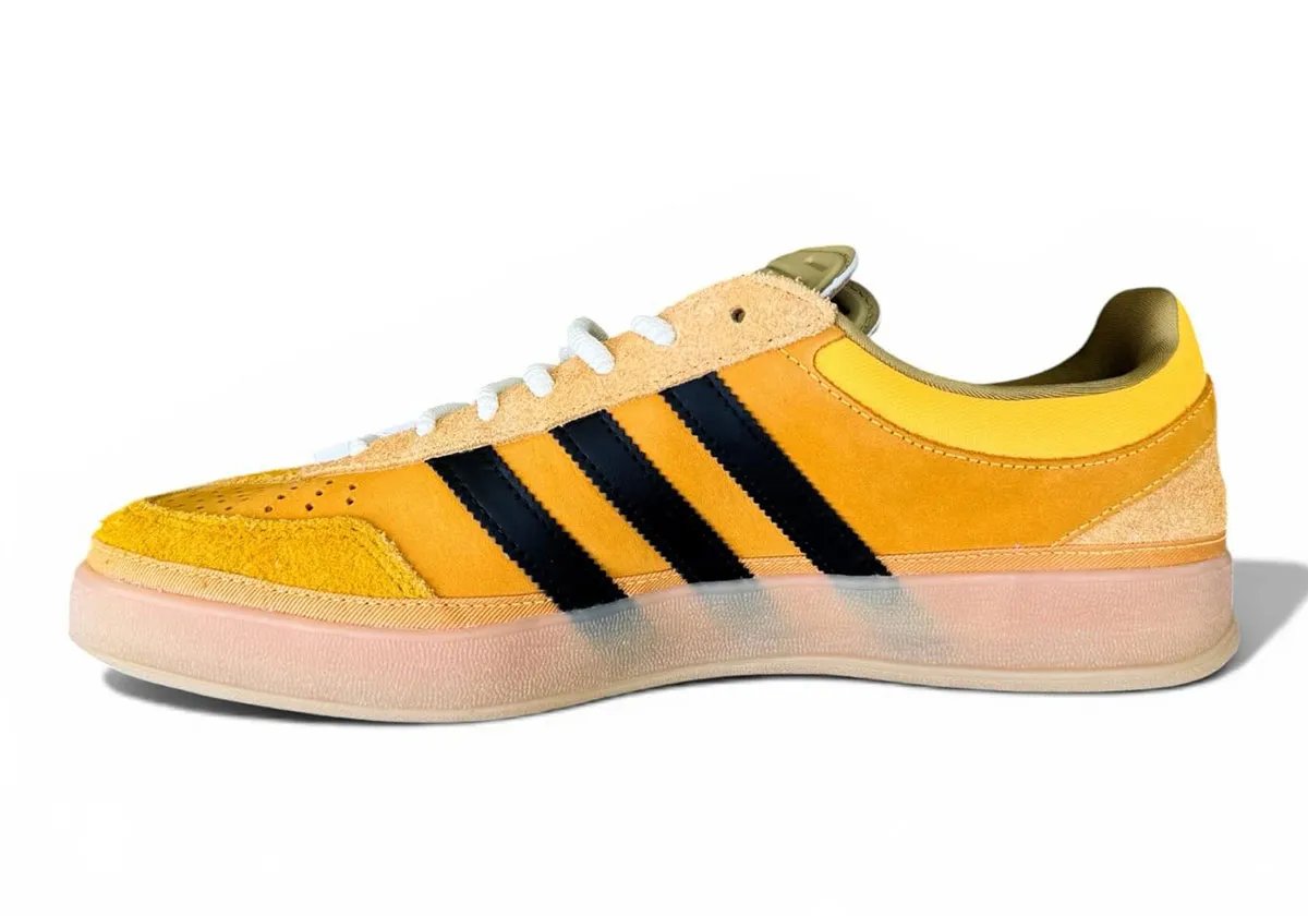 Bad Bunny x adidas Gazelle Indoor in Solar Gold with black stripes, showing canvas foxing and offset T-toe construction - detail view 3