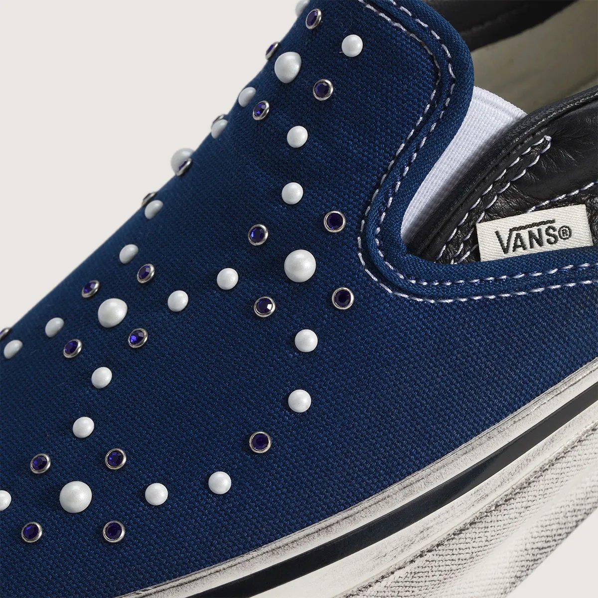 Vans Slip-On in Satoshi Nakamoto-inspired colorway, showing canvas upper and vulcanized sole detail - detail view 4