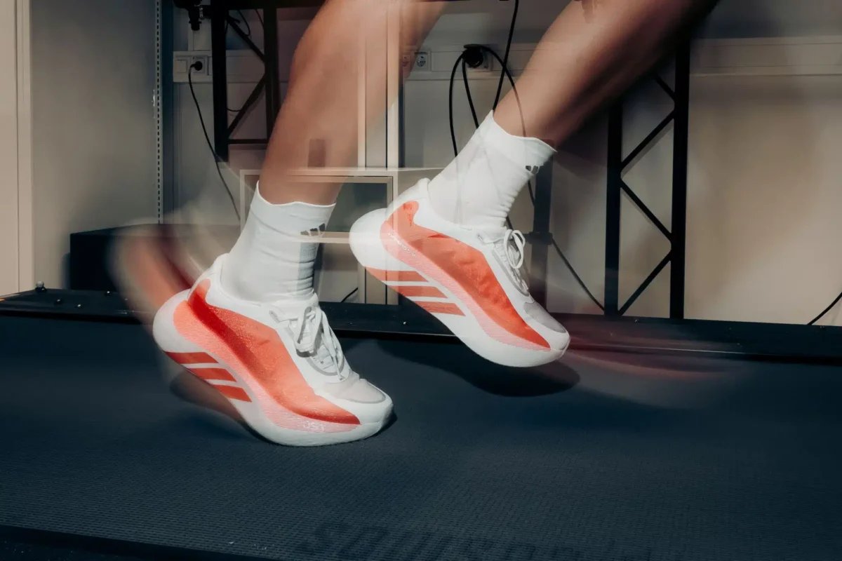 adidas Hyperboost Edge running shoe in neutral colorway showing cushioned midsole and minimalist upper design - detail view 2