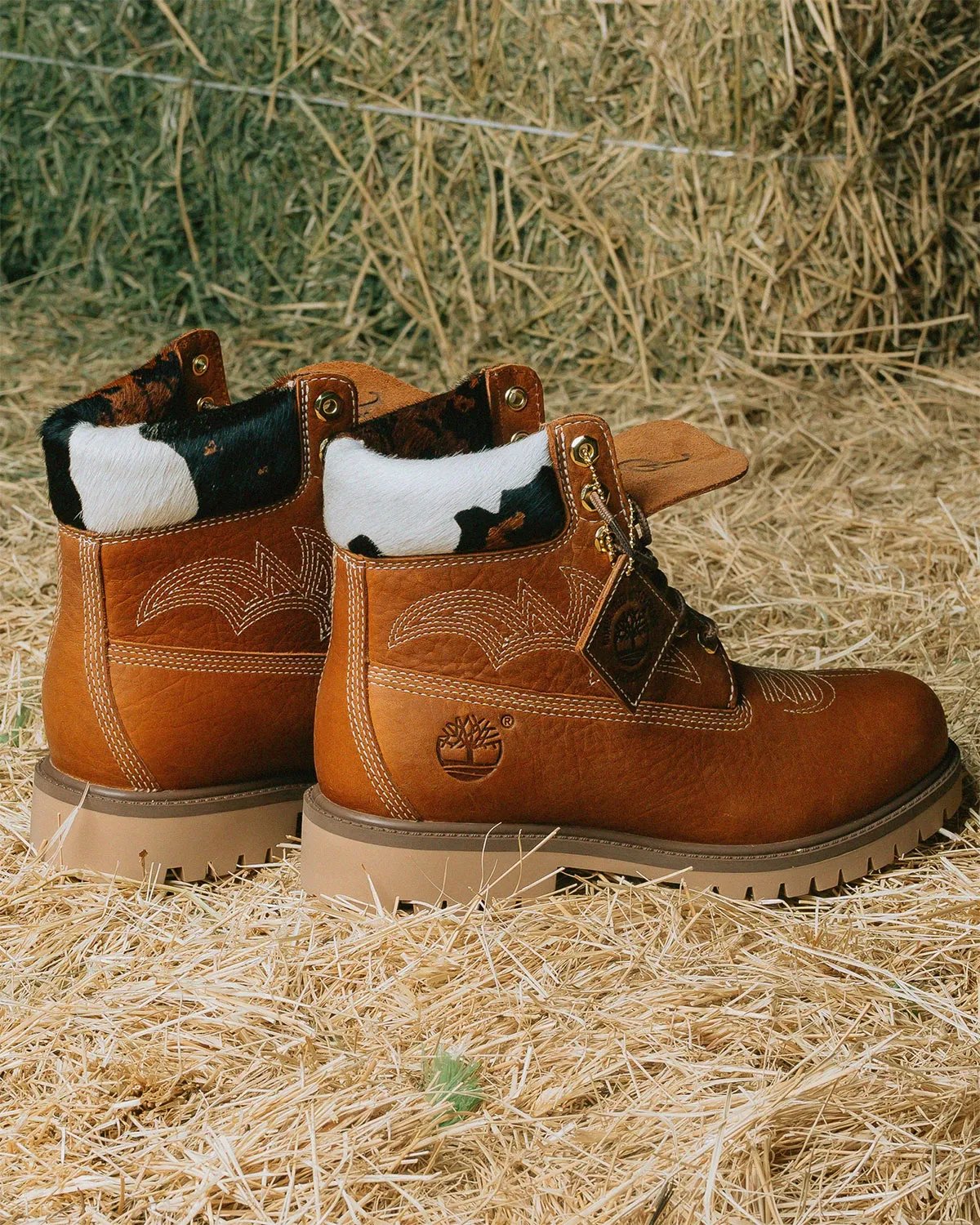 Sneaker Politics x Timberland 6-Inch Boot Outlaw and Rodeo editions featuring pebbled leather, Western stitching, and cow-print detailing