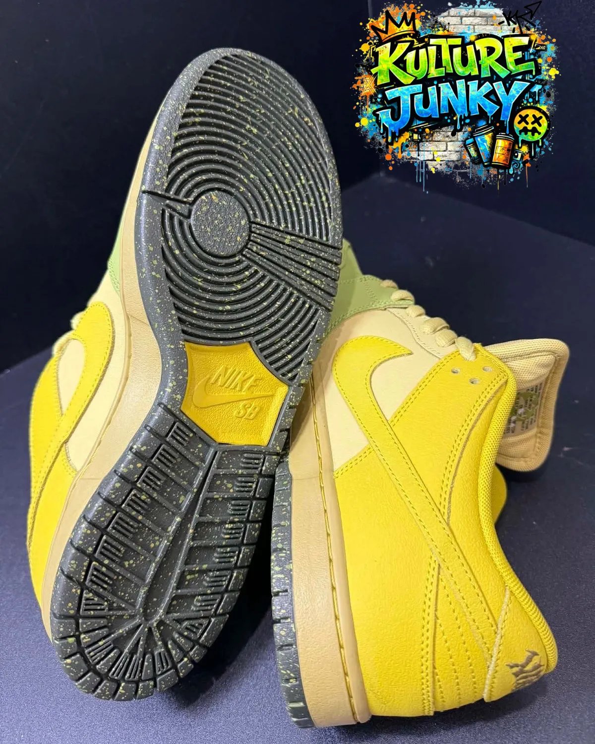 Nike SB Dunk Low in Saffron Quartz with flame graphics on the upper - detail view 2