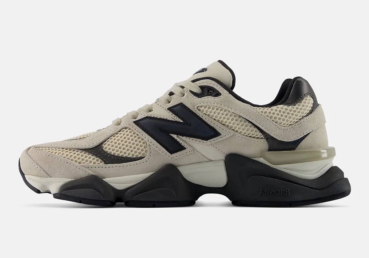 New Balance 9060 Timberwolf featuring grey suede paneling with black midsole and accents - detail view 2