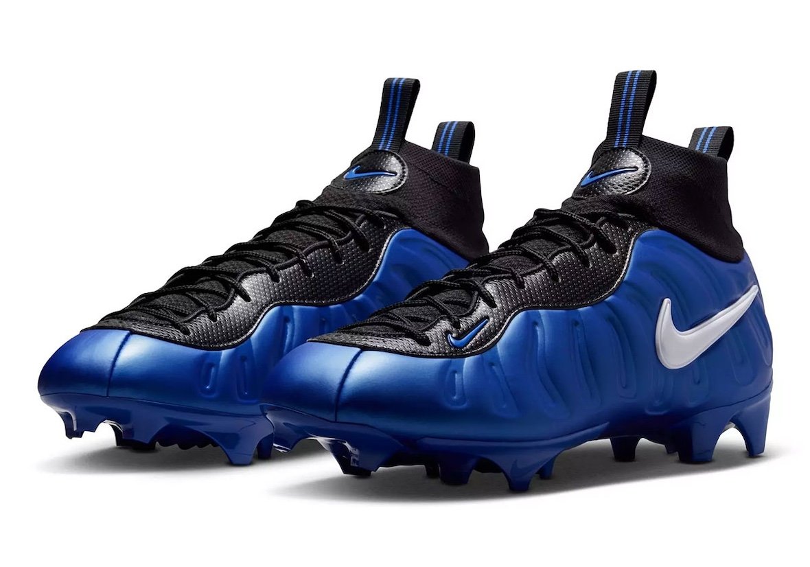 Nike Vaporposite Pro Game Royal and University Red football cleats with molded Foamposite uppers and white Swoosh detailing - detail view 2