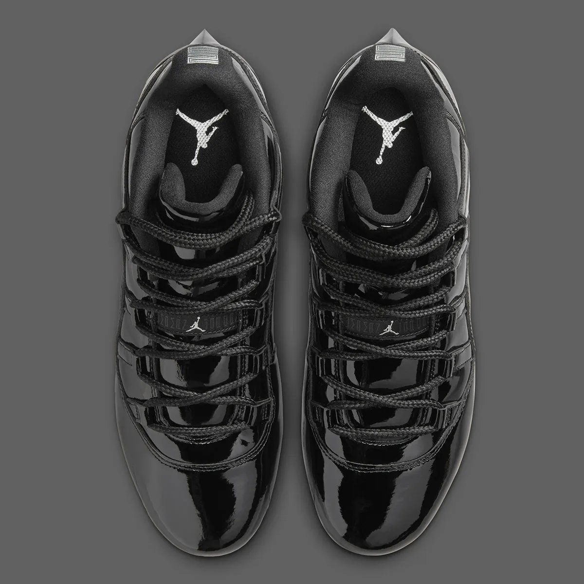 Air Jordan 11 Football Cleat in Anthracite colorway with patent leather collar and carbon fiber shank detail - detail view 3