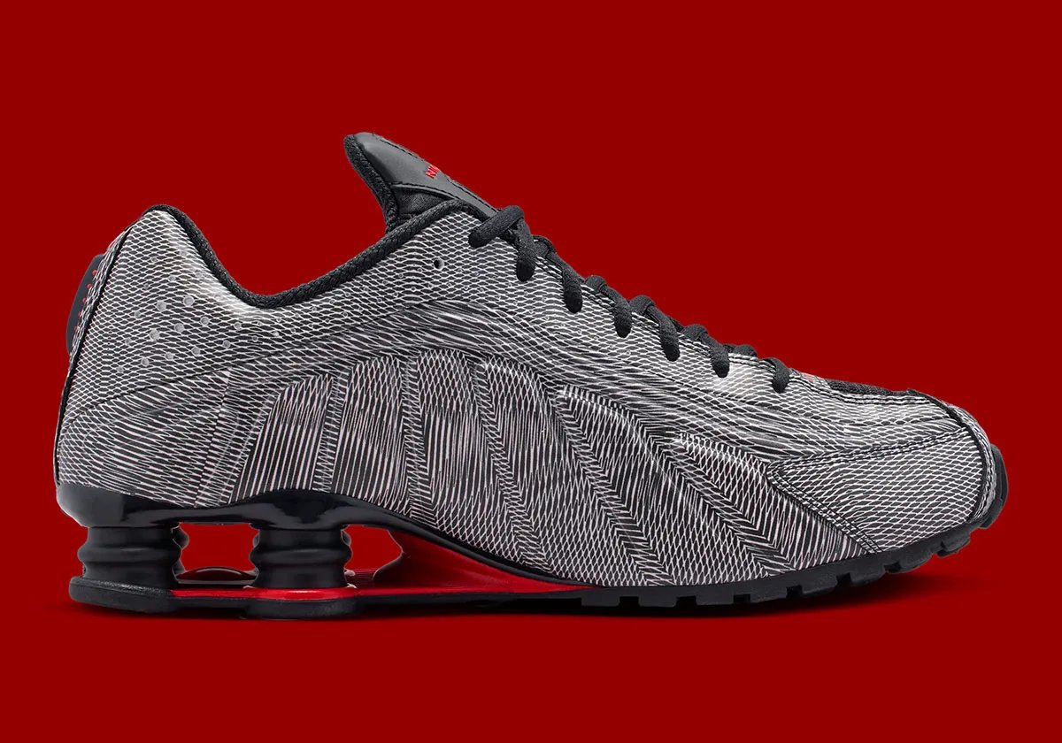 Nike Shox R4 Optical Illusion featuring black and white kinetic patterning across the upper with red mini Swoosh accents - detail view 3