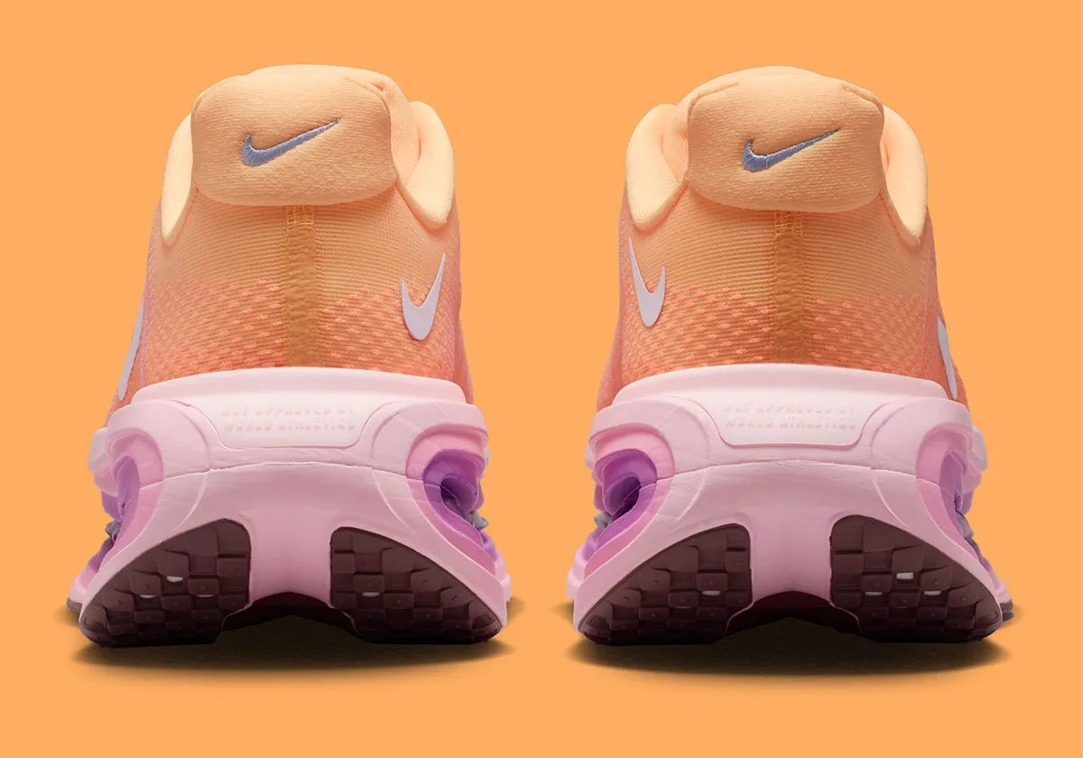 Nike Vomero Premium in Tangerine Tint colorway, showing side profile of the premium lifestyle running shoe - detail view 4