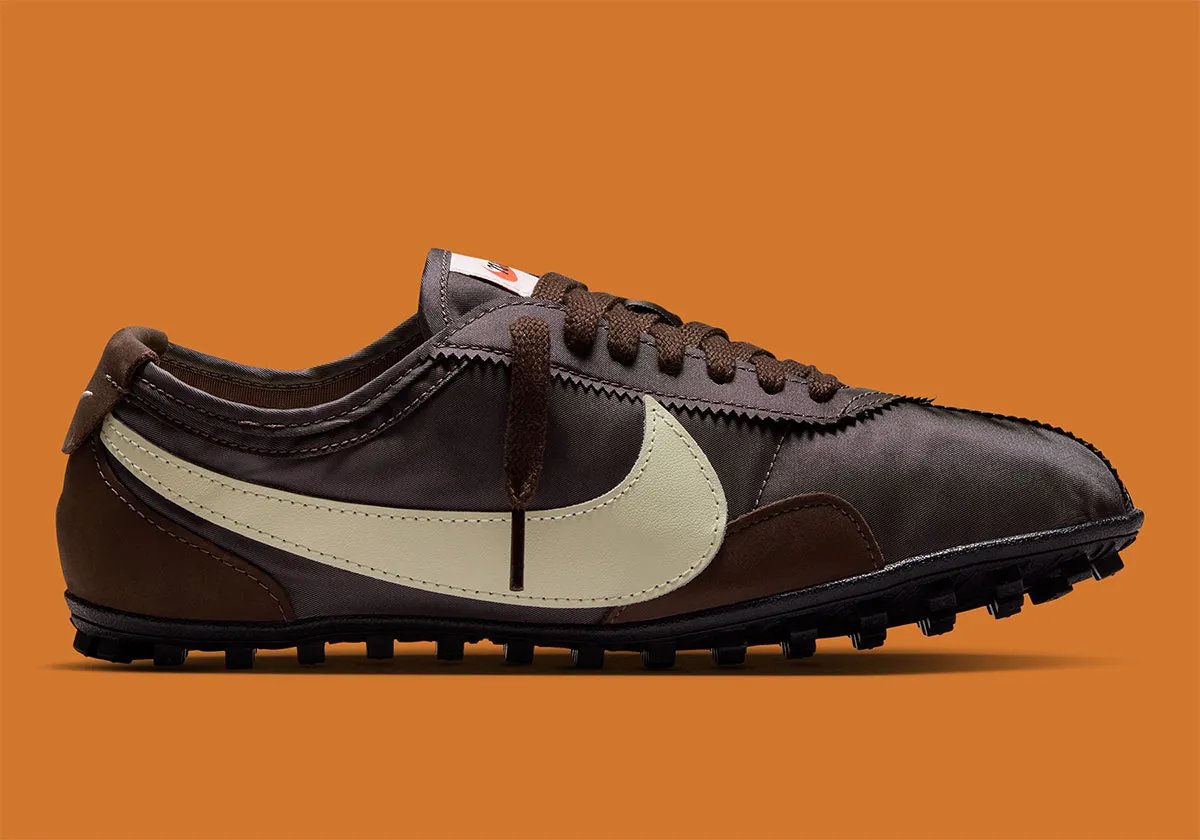 Nike Moon Shoe in Malachite and Baroque Brown colorways featuring oversized Swoosh and gum rubber sole - detail view 2