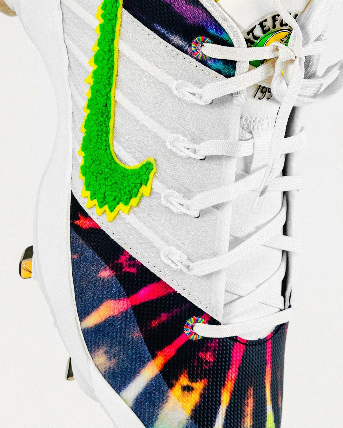 Nike Sabrina 3 GD MTL baseball cleat in tie-dye with chenille Swoosh, Oregon Ducks Grateful Dead player exclusive - detail view 4