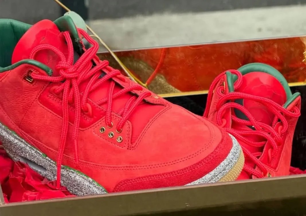 Unreleased Teyana Taylor x Air Jordan 3 sample in red and grey displayed at Dyckman Basketball League