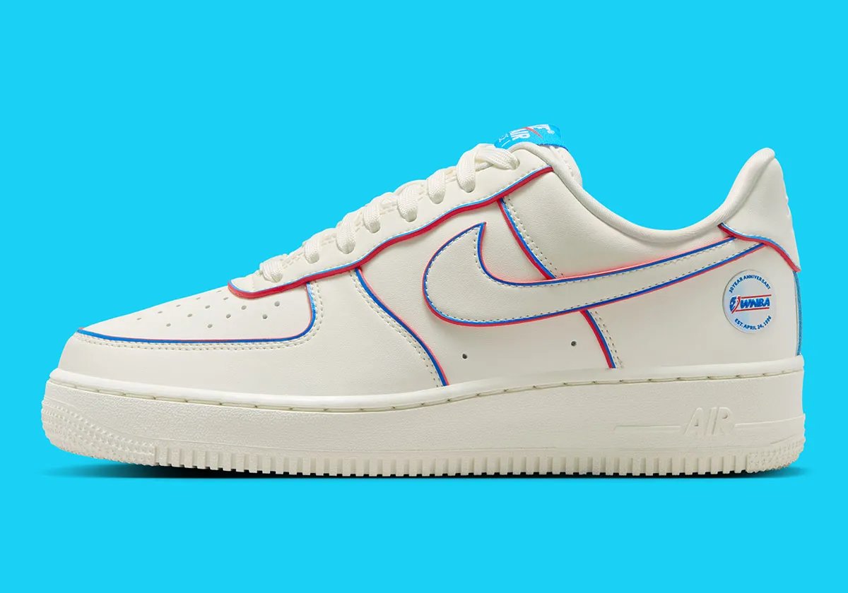 Nike Air Force 1 Low in off-white leather with blue piping and red leather edges for WNBA 30th Anniversary release - detail view 1