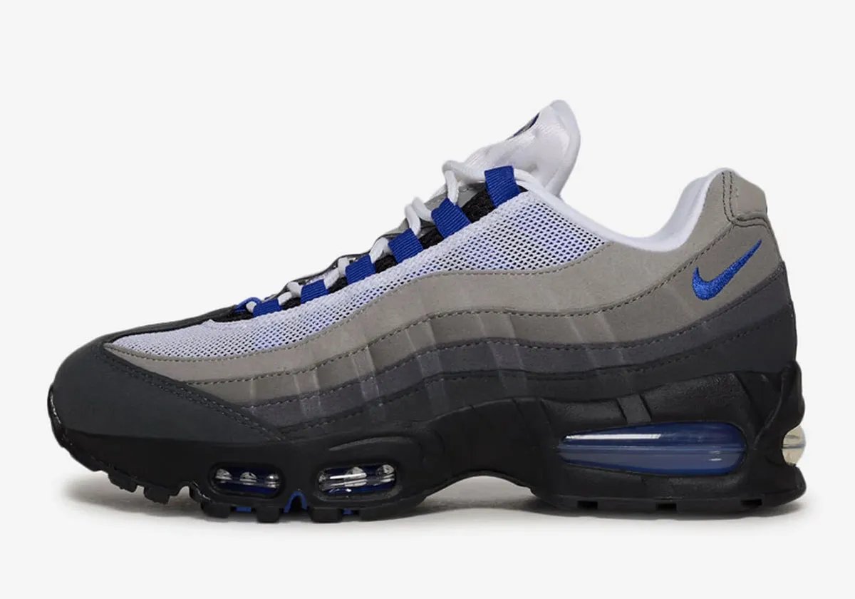 Nike Air Max 95 Old Royal women's sneaker in deep navy blue with white mesh and neutral grey sidewalls - detail view 1
