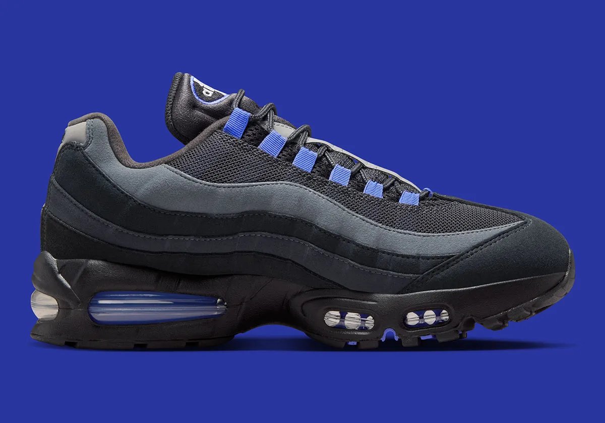 Nike Air Max 95 Sapphire in lateral profile view showing the distinctive dual-bubble Air Max unit and jewel-tone upper construction - detail view 2
