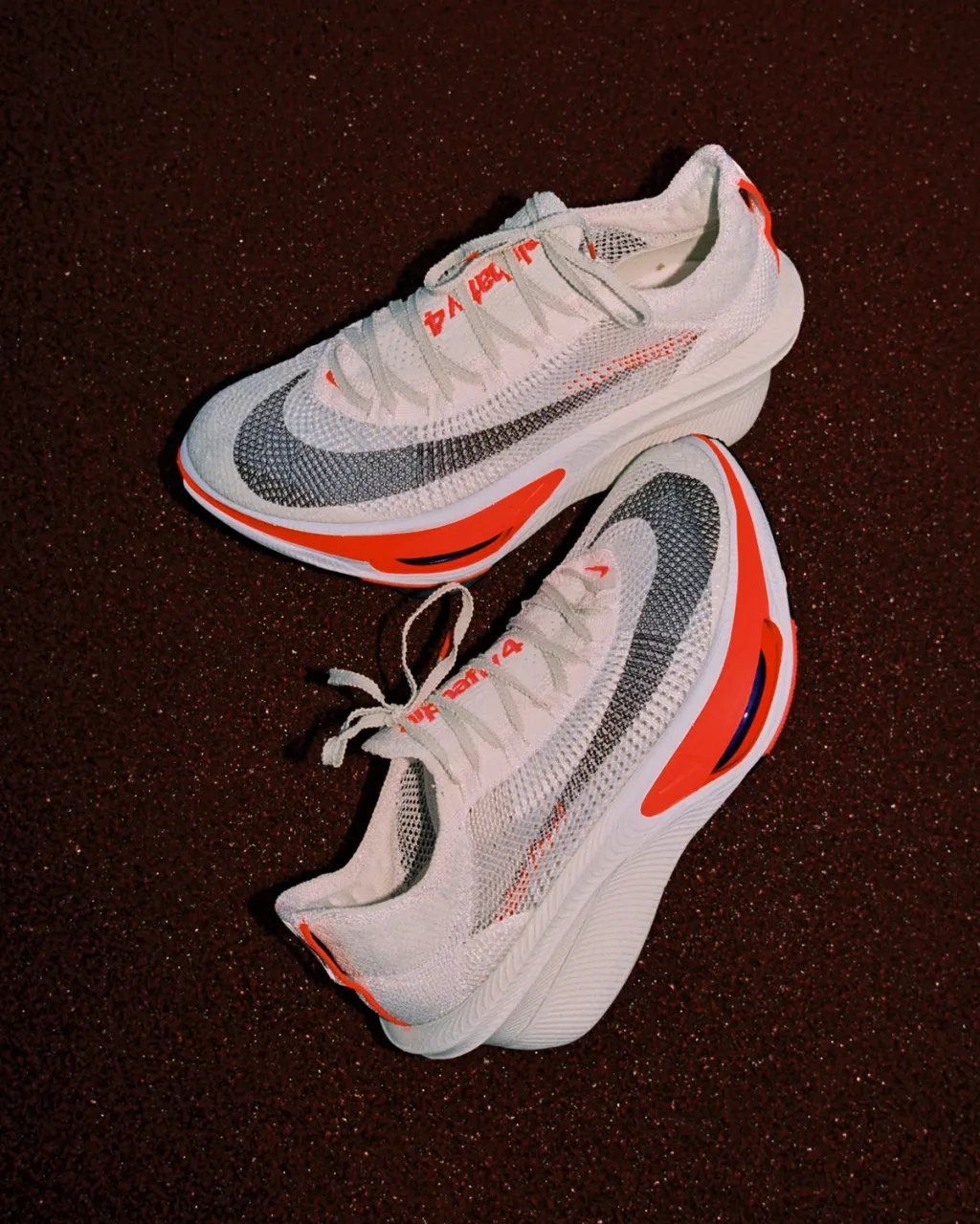 Nike Alphafly 4 marathon racing shoe showcasing the carbon plate and responsive foam platform