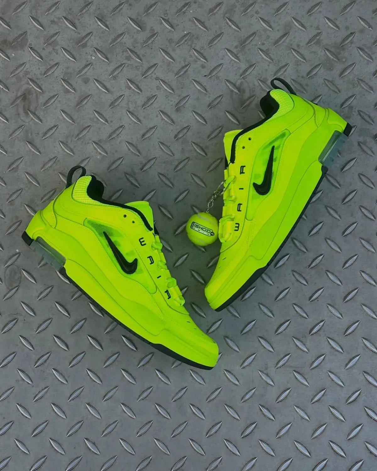 Nike SB Air Max Ishod in neon green tennis ball colorway with black accents and branded tennis ball hangtag - detail view 1