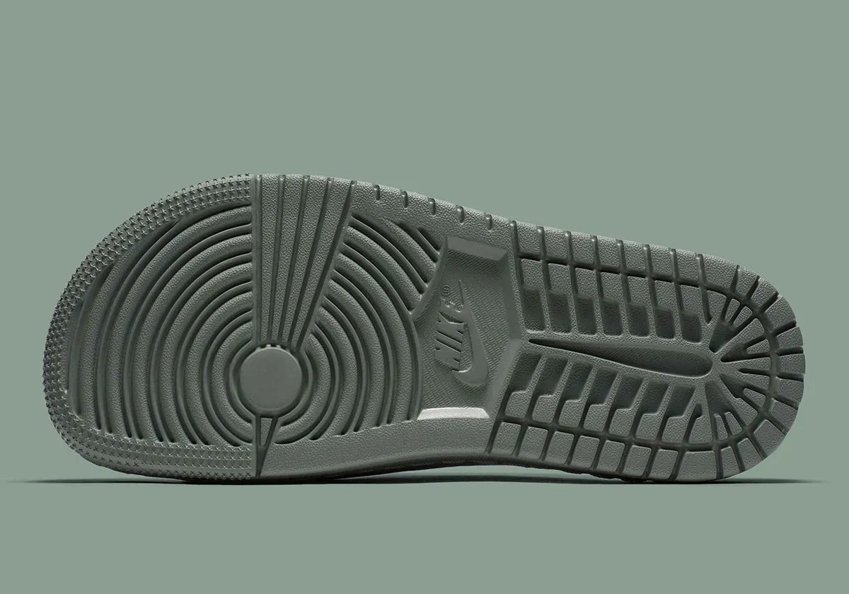 Jordan Modero 1 Slide in neutral colorway showing premium material construction and minimal branding - detail view 3