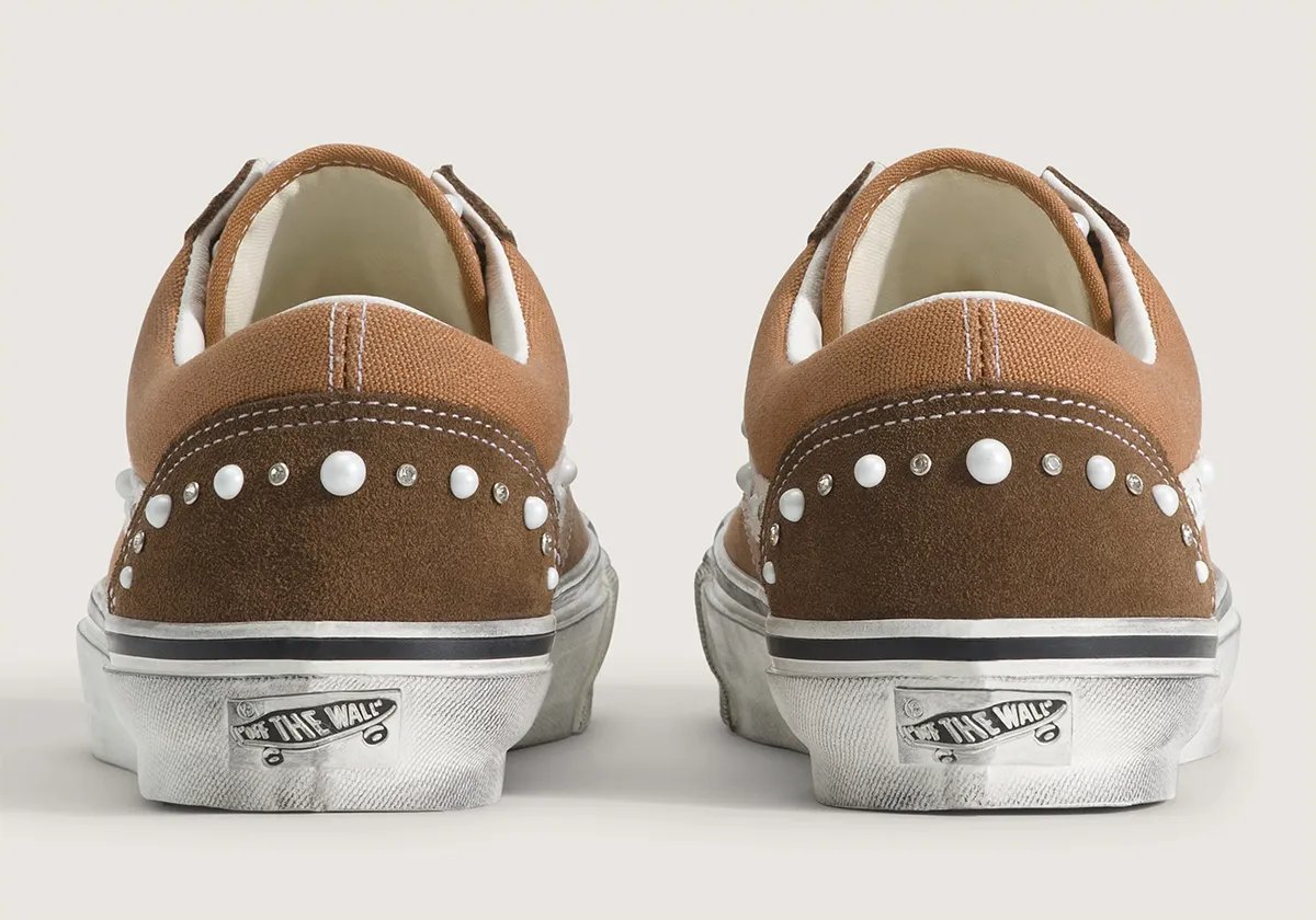 Vans Old Skool in Vintage Cocoa Brown with pearlized finish, showing side profile and iridescent detailing - detail view 1