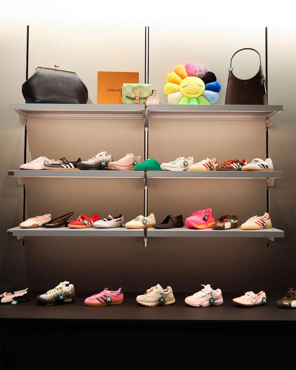 Interior view of StockX's renovated NYC flagship store in SoHo, displaying sneaker inventory and retail display fixtures - detail view 5