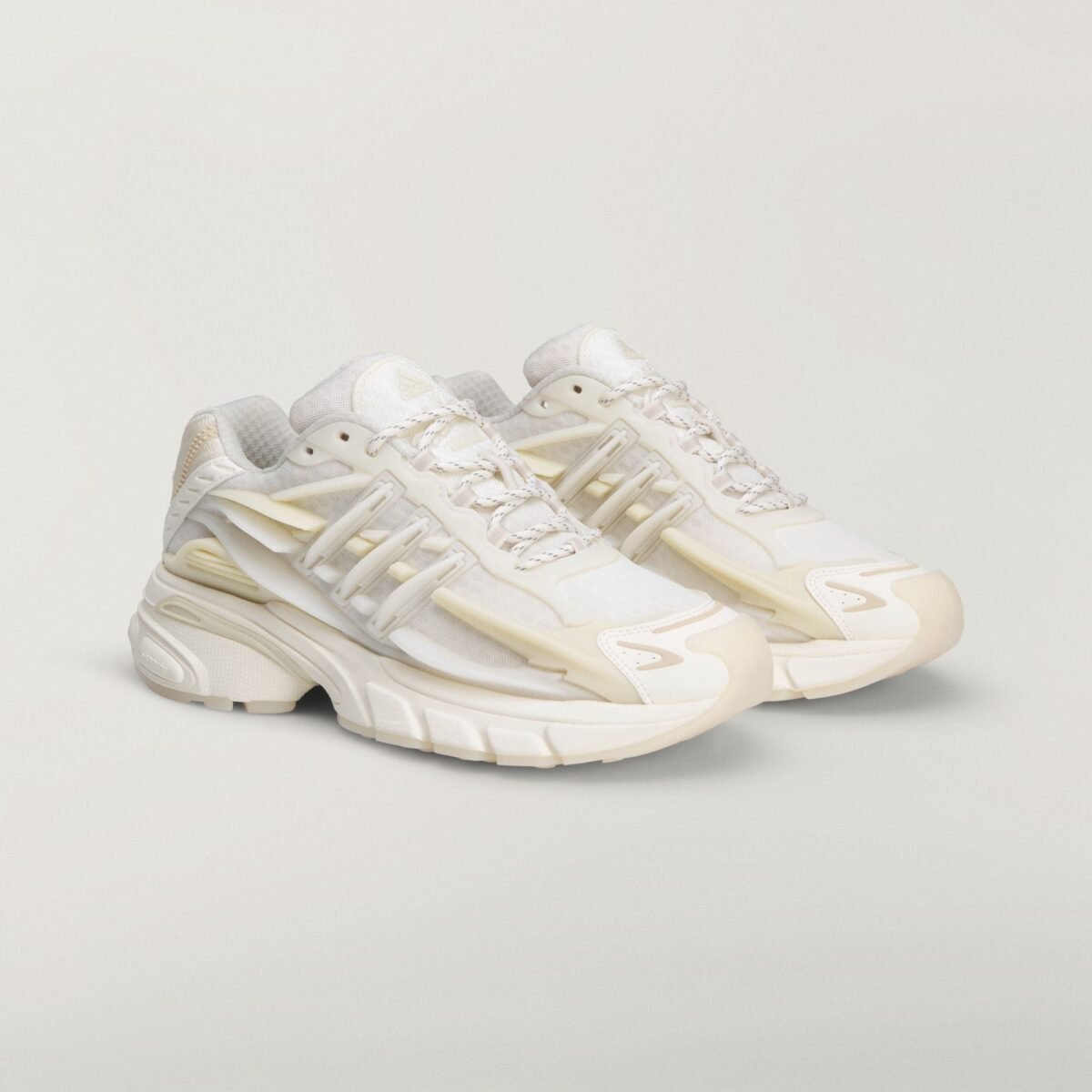 Pharrell Williams x adidas Adistar Jellyfish in Core White, Off White, and Clear Brown colorway shown from multiple angles - detail view 4