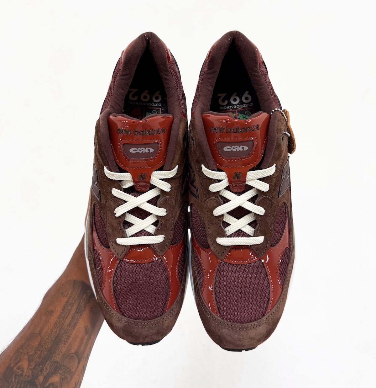 Aminé x New Balance 992 'Outdoor School' in reddish-brown with suede, mesh, and patent leather upper, featuring Club Banana tongue branding - detail view 4