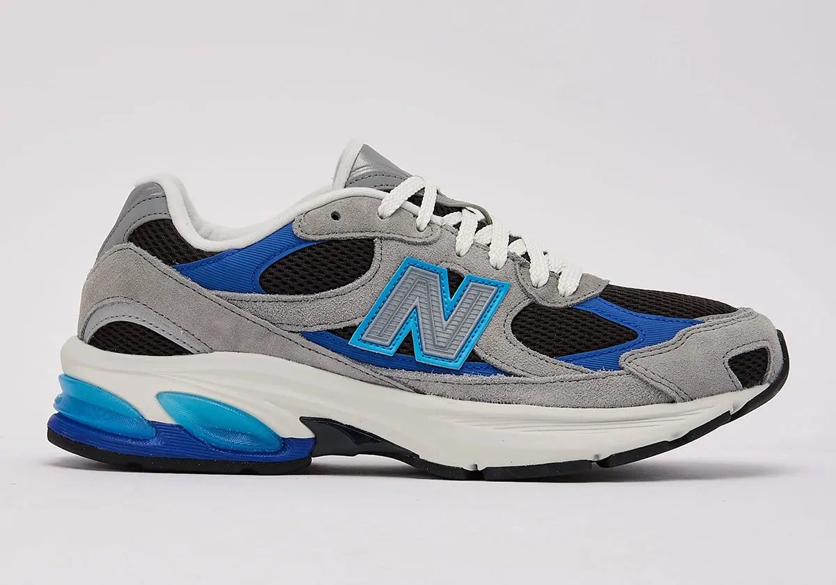 New Balance 2010 in grey suede and black mesh with royal blue and baby blue accents, retail colorway - detail view 2