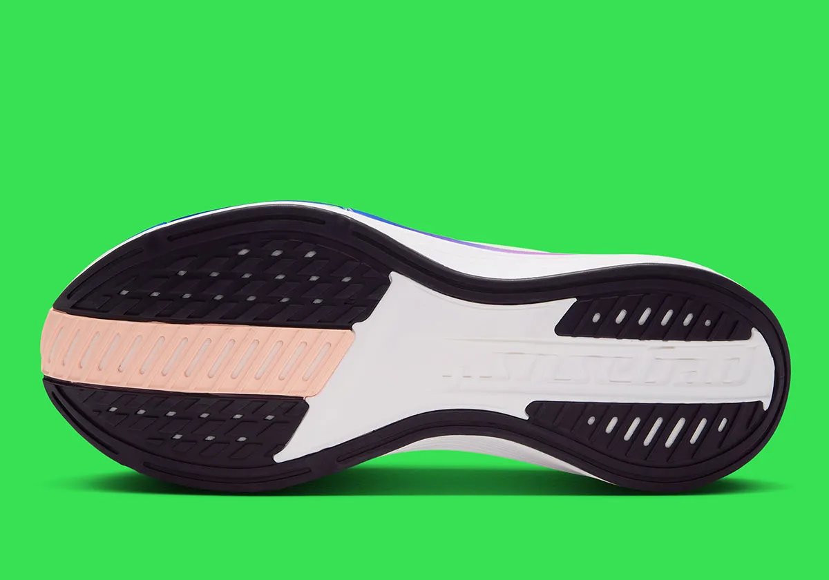 Nike Pegasus Plus 2 in White/Volt colorway featuring visible forefoot Zoom Air and Volt accents - detail view 1