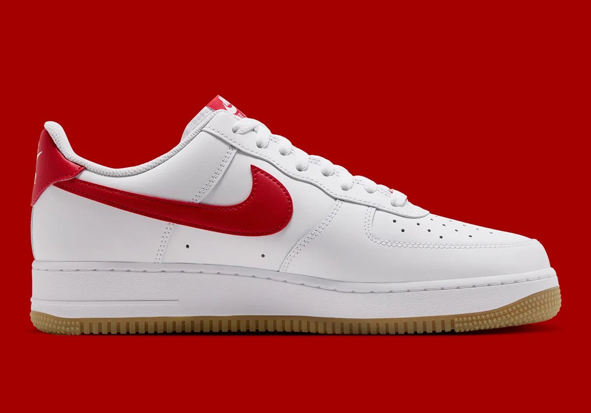 Nike Air Force 1 Low in White leather with Challenge Red Swoosh and Gum Light Brown outsole, shown from multiple angles - detail view 3