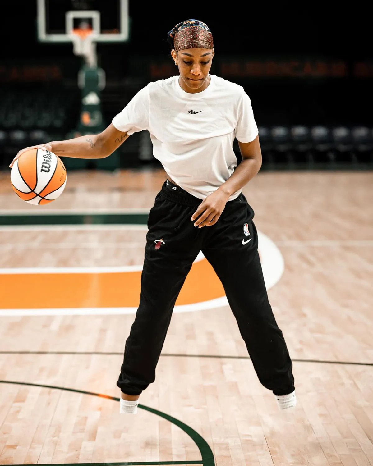 A'ja Wilson in Nike A'Two signature basketball shoe, professional player footwear - detail view 2