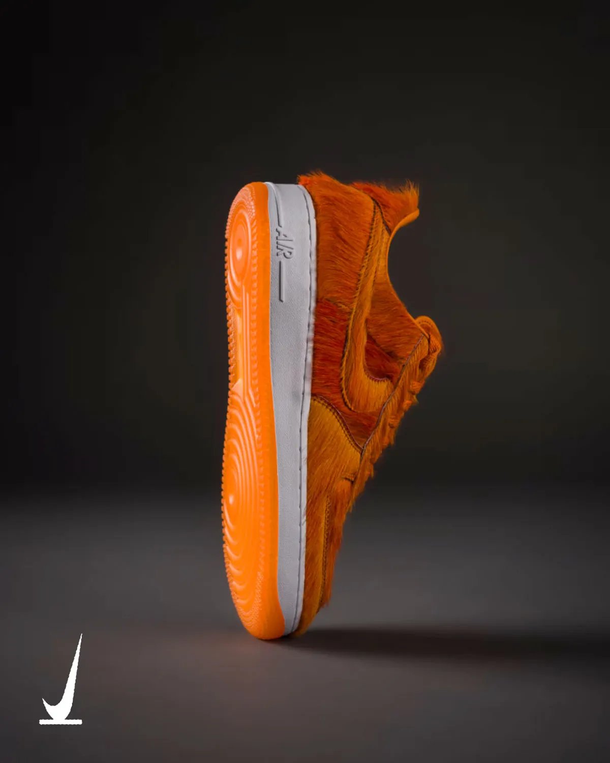 Nike Air Force 1 Low in Campfire Orange pony hair with white midsole, showing full faux fur coverage across upper - detail view 3