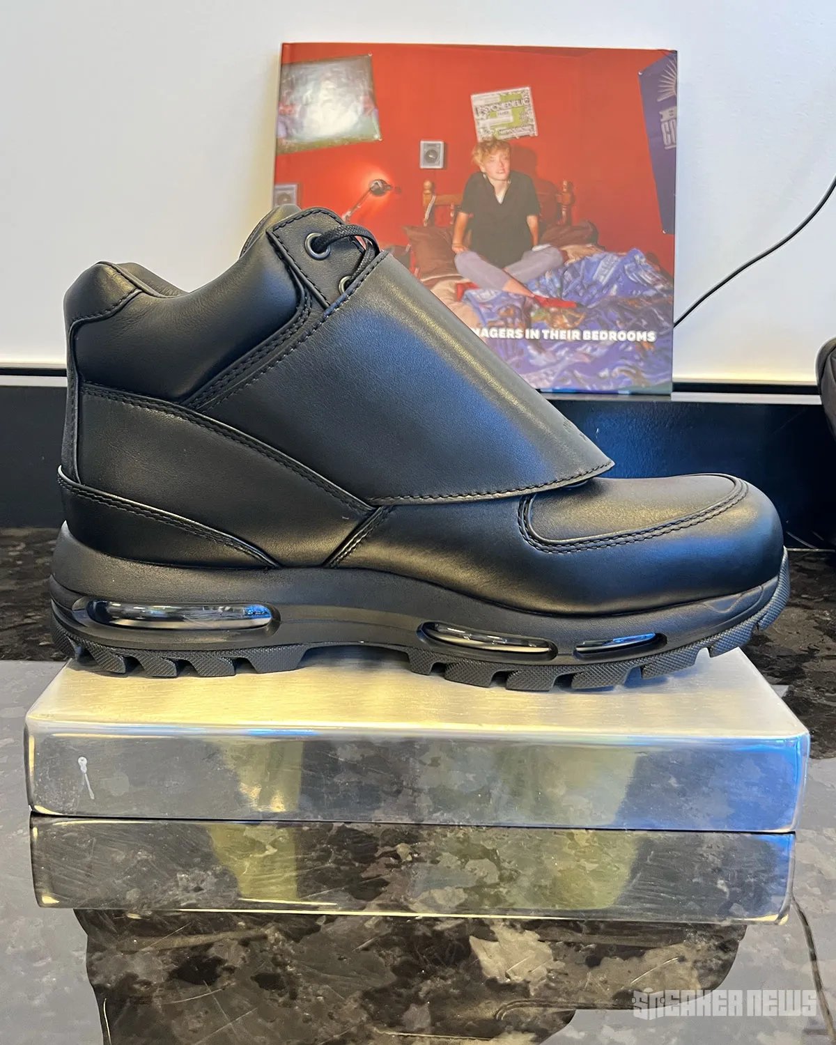 Public School NY x Nike Air Goadome in Triple Black with oversized metal buckle hardware detail on leather tongue - detail view 2