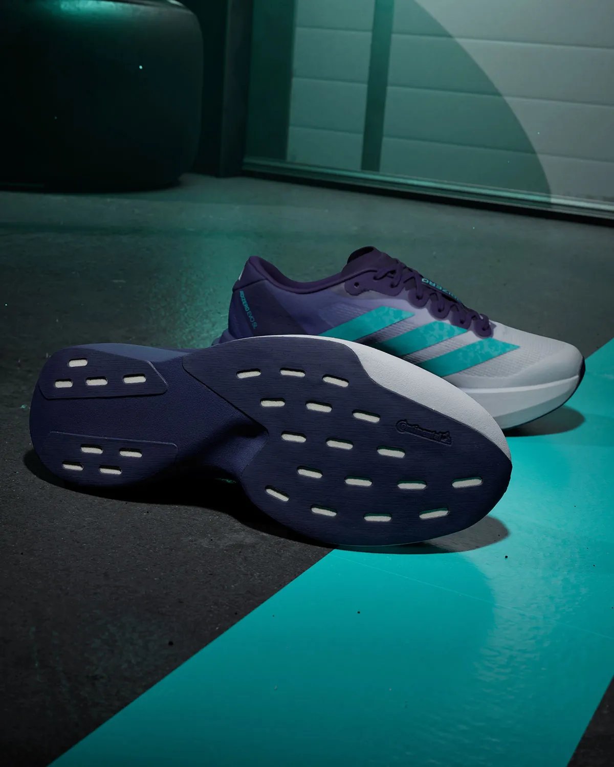 Mercedes AMG Petronas F1 x adidas adiZero EVO SL in Vanda orchid purple gradient with hi-vis teal Three Stripes accents