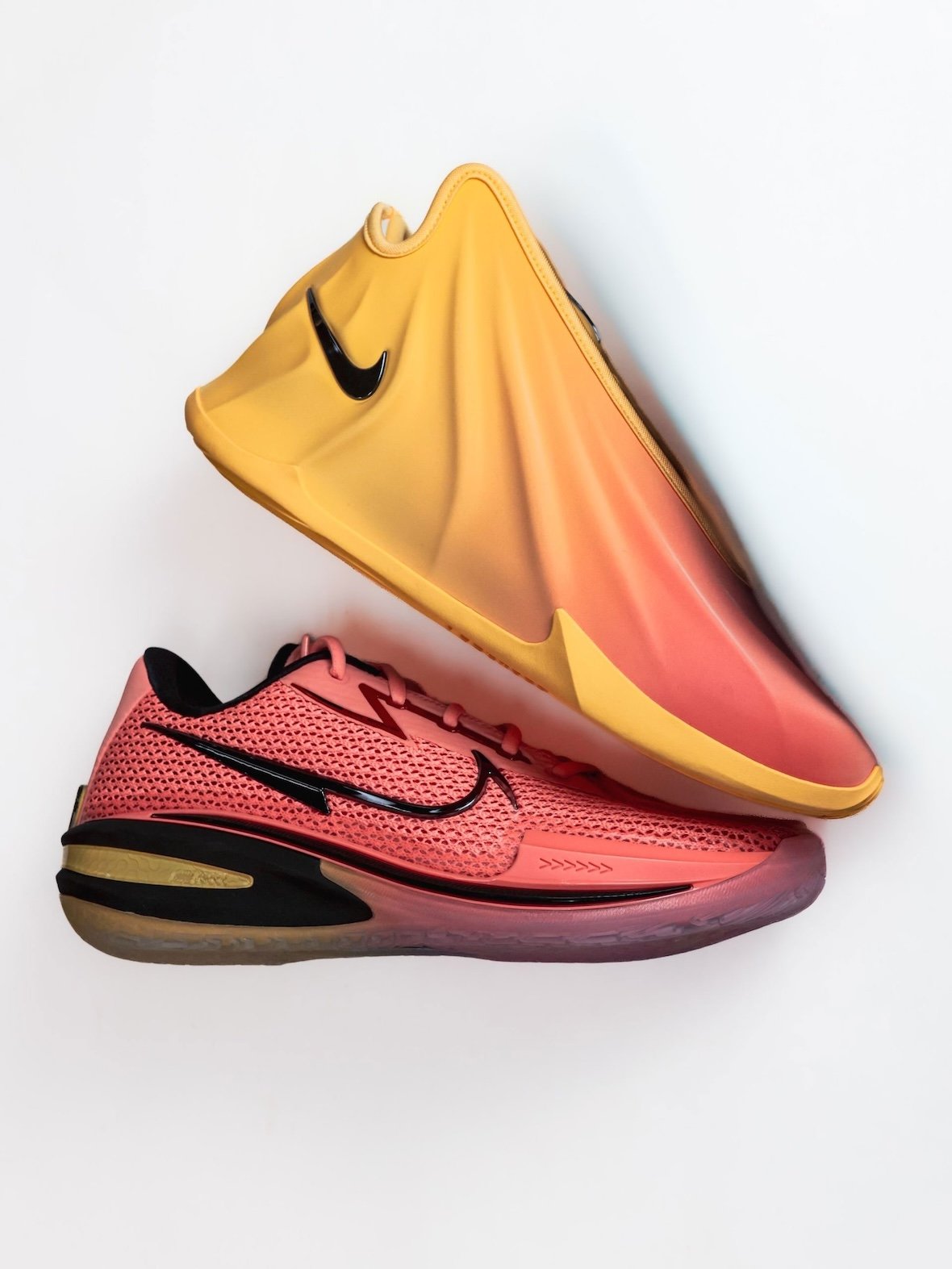 Nike GT Future EYBL exclusive in peach-to-yellow gradient with metallic silver Swoosh and black laces - detail view 2